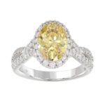 14K WHITE GOLD 3 1/4CT ROUND/YELLOW OVAL DIAMOND LADIES RING (CENTER STONE YELLOW OVAL DIAMOND 2CT)
