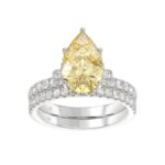 14K WHITE GOLD 3 3/4CT ROUND/PEAR DIAMOND LADIES BRIDAL SET (CENTER STONE PEAR YELLOW DIAMOND 3.00CT)