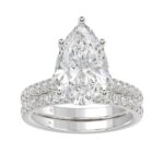 LADIES BRIDAL SET 4 1/2CT ROUND/PEAR DIAMOND 14K WHITE GOLD (CENTER STONE PEAR DIAMOND 4CT )